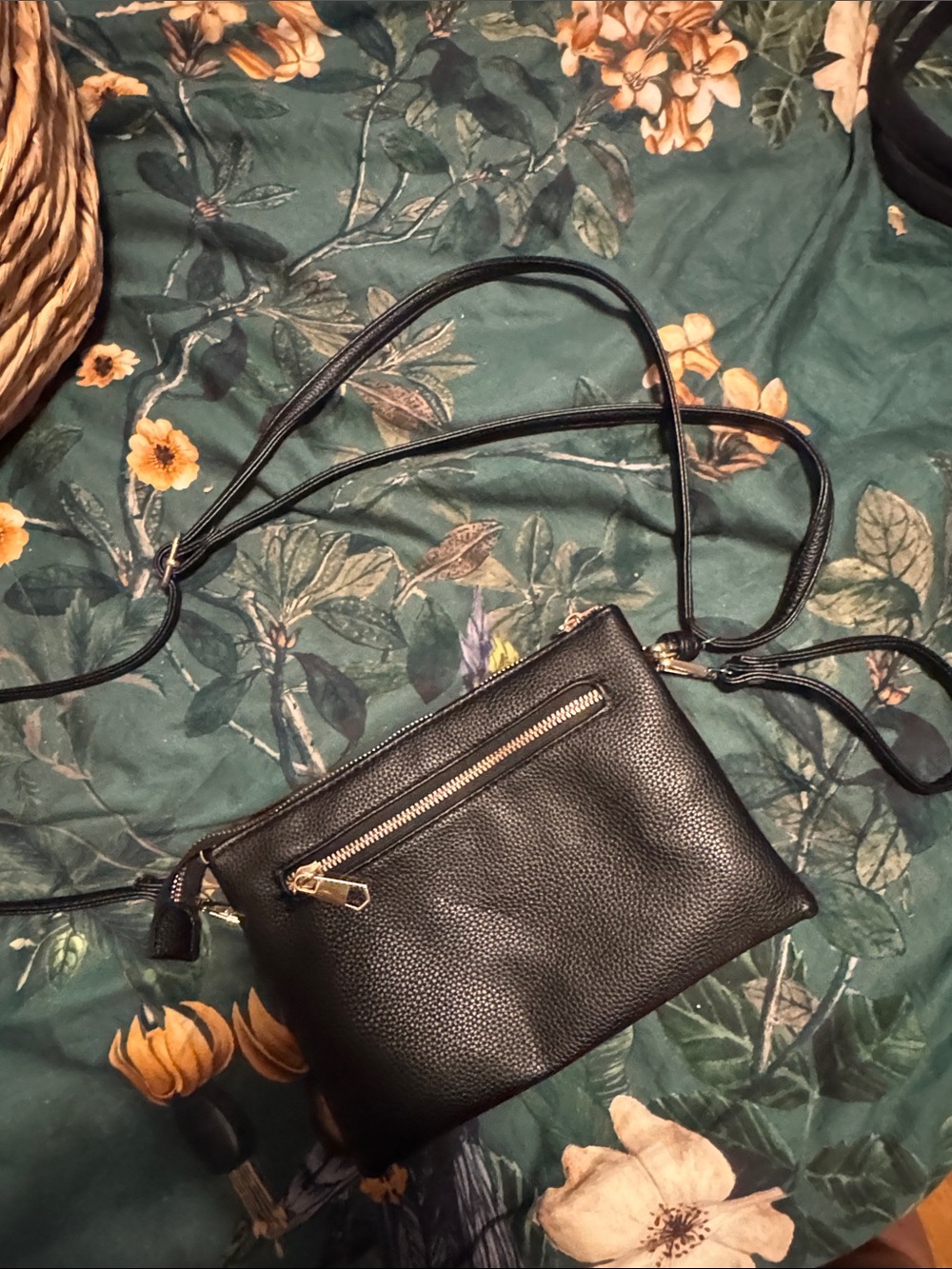 Sleek Black Pebbled Crossbody Bag with Gold-Tone Zip